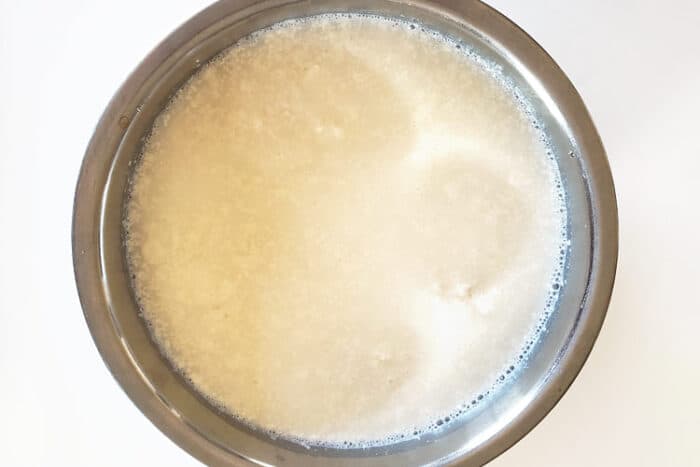 Large curd cottage cheese in cold water.