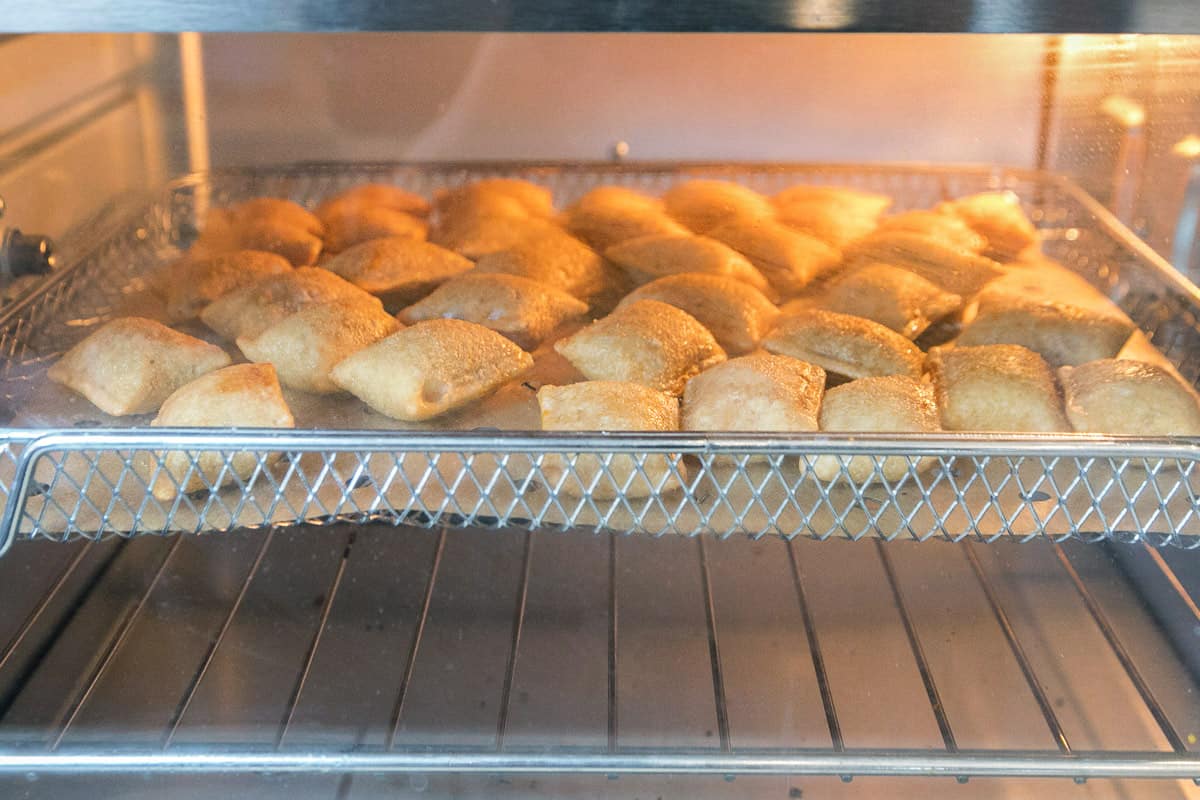 Pizza rolls in the air fryer at three hundred and ninety degrees Fahrenheit for eight to ten minutes. Flip over halfway through cooking time.