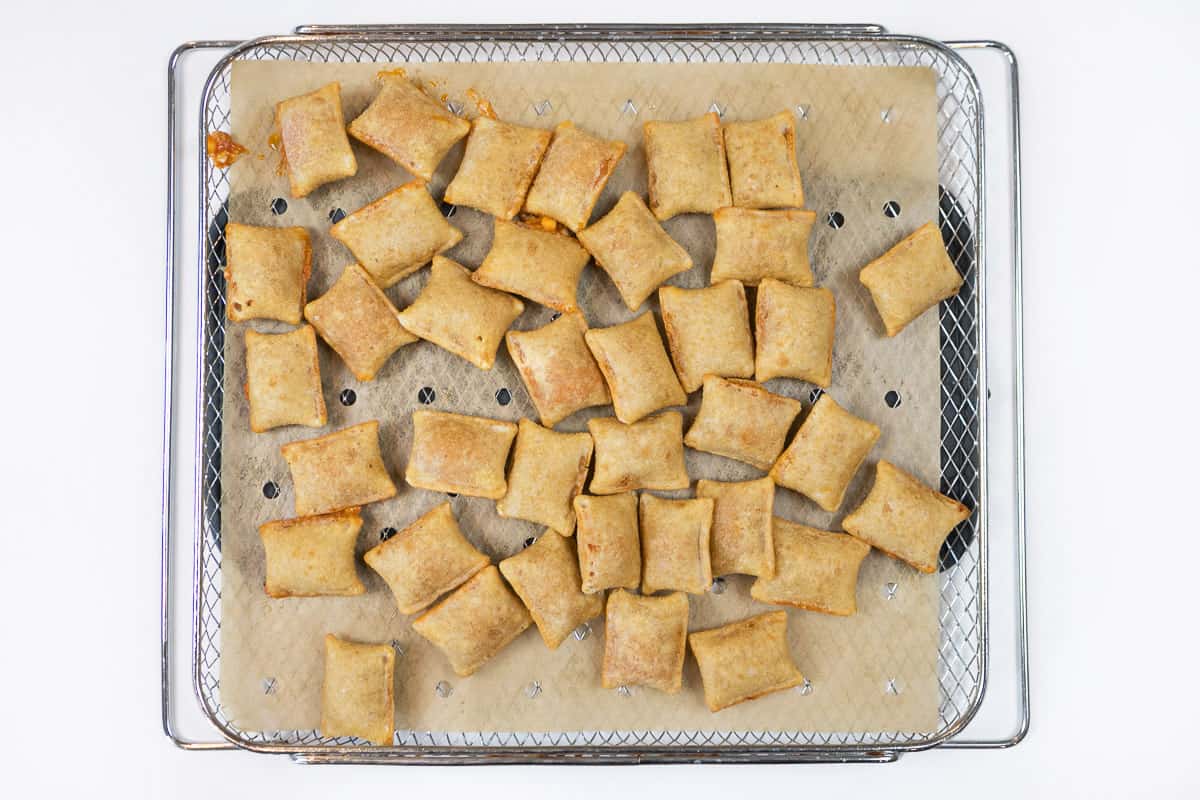 Crispy pizza rolls after cooking in the air fryer.
