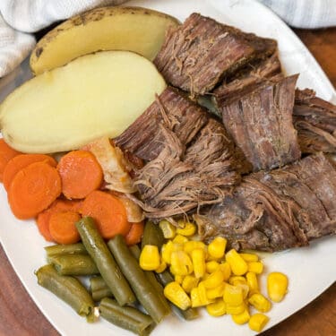 Pot roast cooked in the oven all done on a plate.