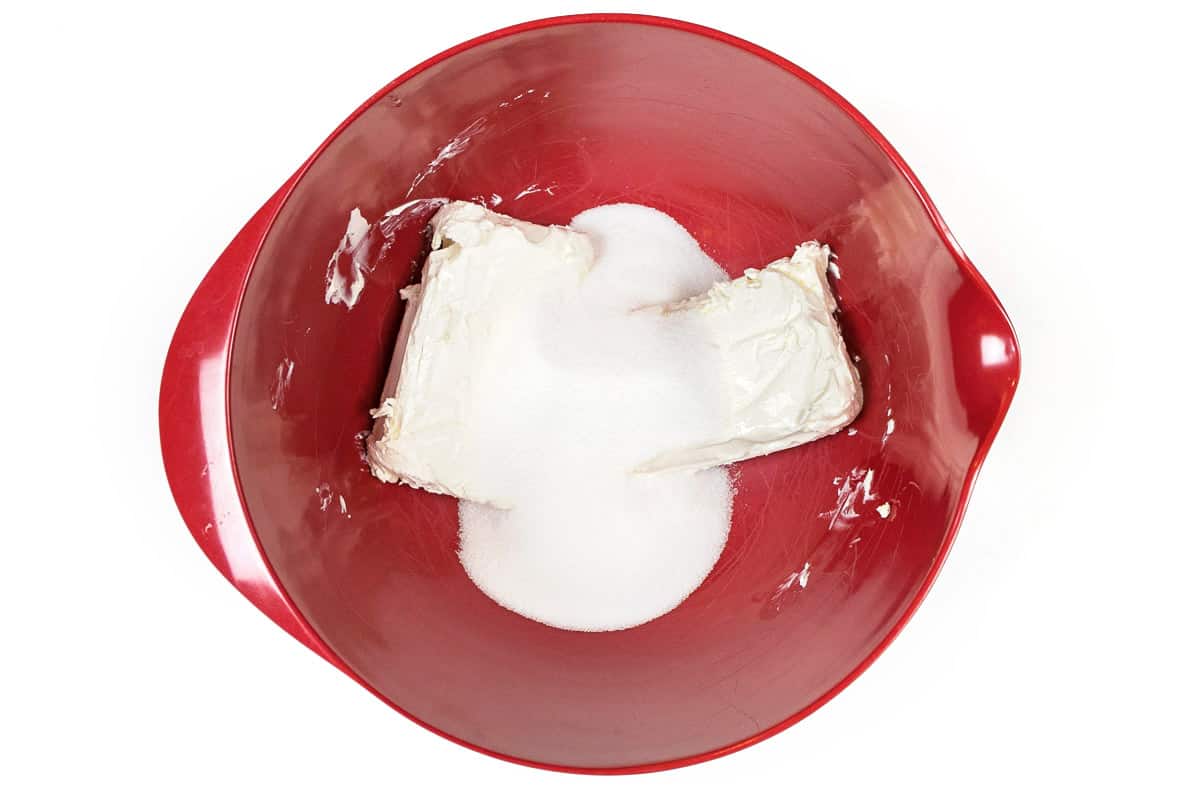 Cream cheese and sugar in a large bowl.
