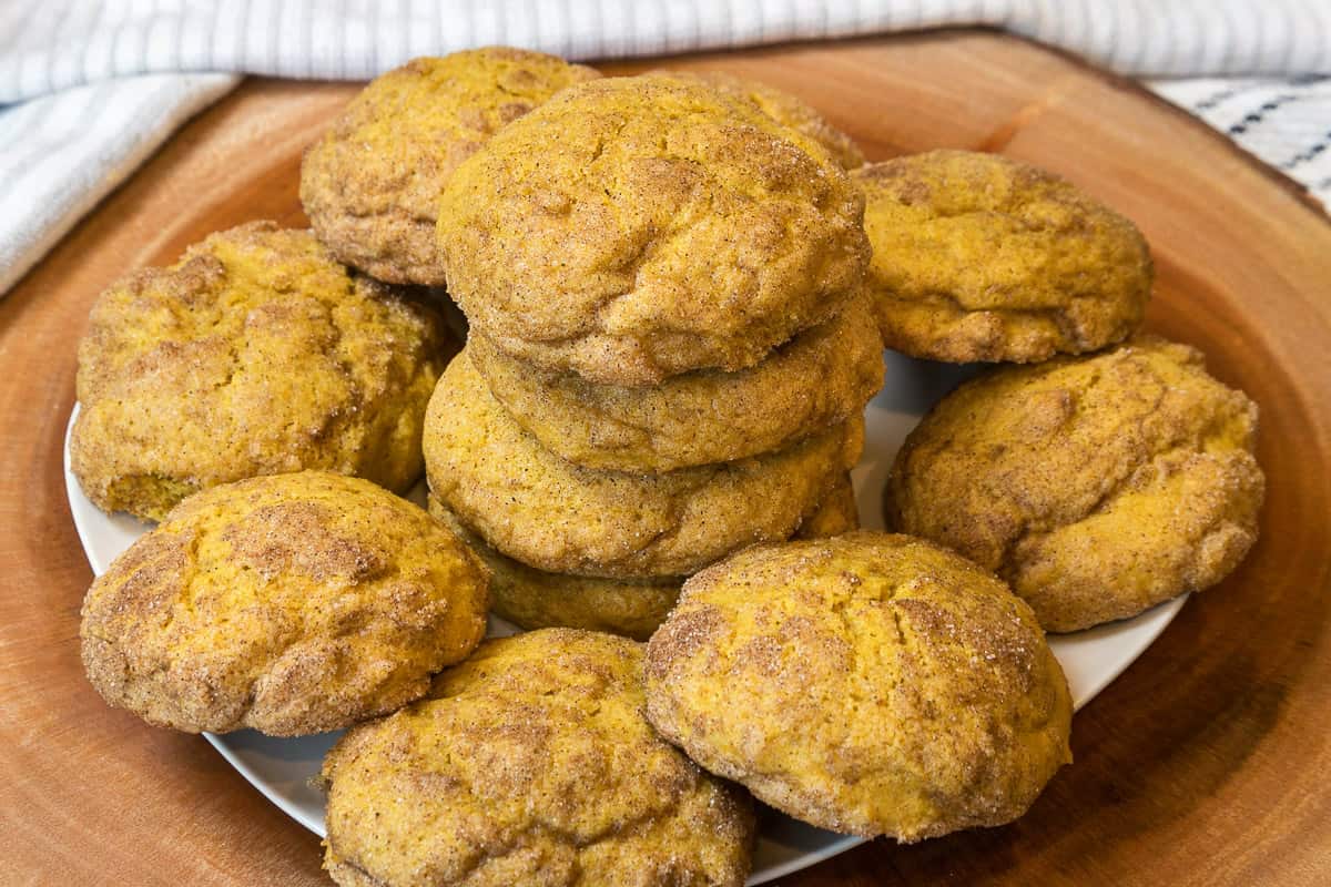 Pumpkin snickerdoodle cookies on a plate.