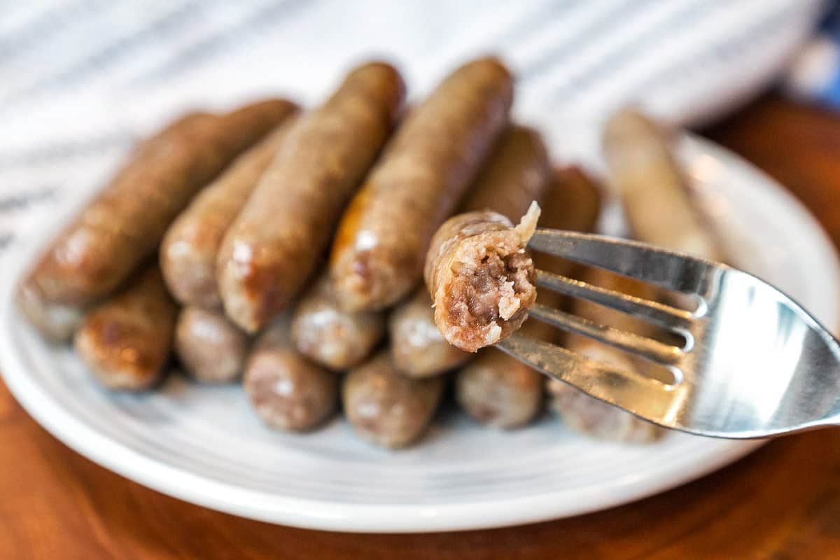 Link sausages on a plate.