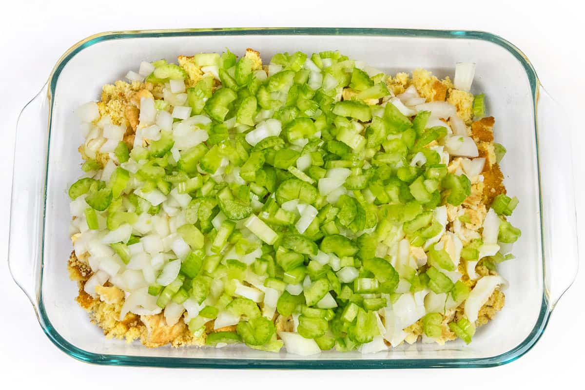 Chopped celery added over the top of the onions, hard-boiled eggs, crumbled Ritz crackers, and crumbled cornbread in a baking dish.