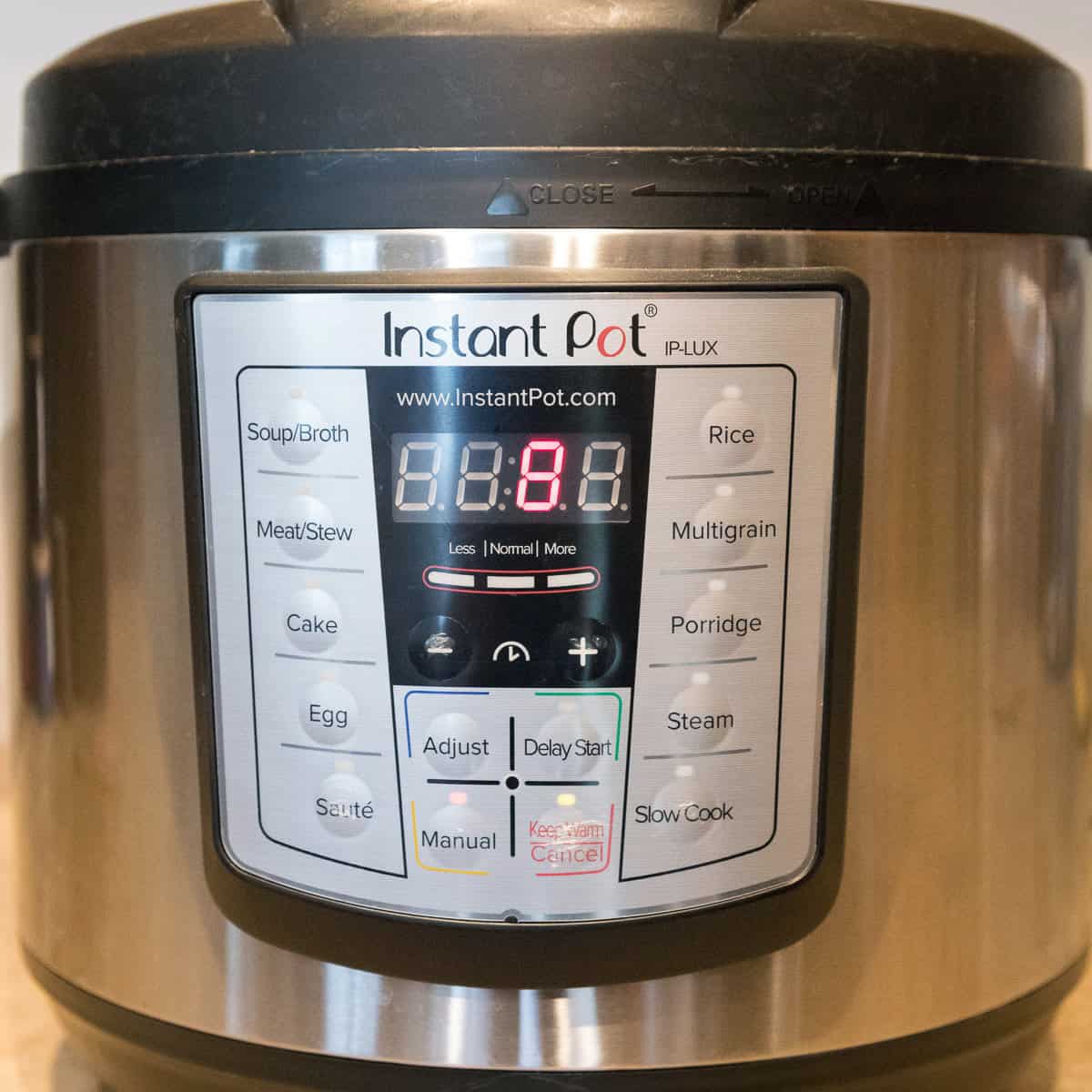 Set the Instant Pot to manual for eight minutes to cook the spaghetti noodles.