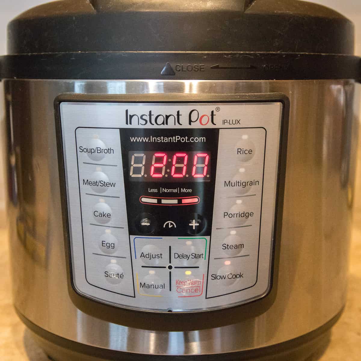 Photo of instant pot set on slow cook setting.