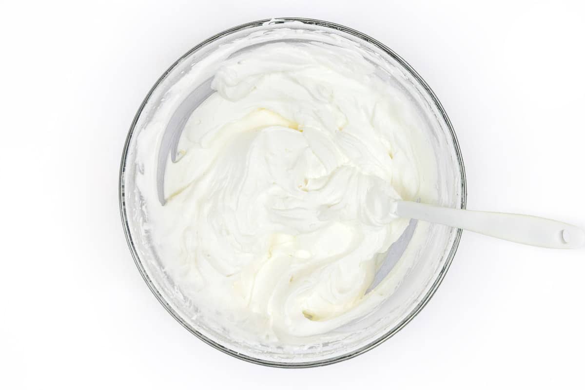 Homemade whipped cream in a bowl.