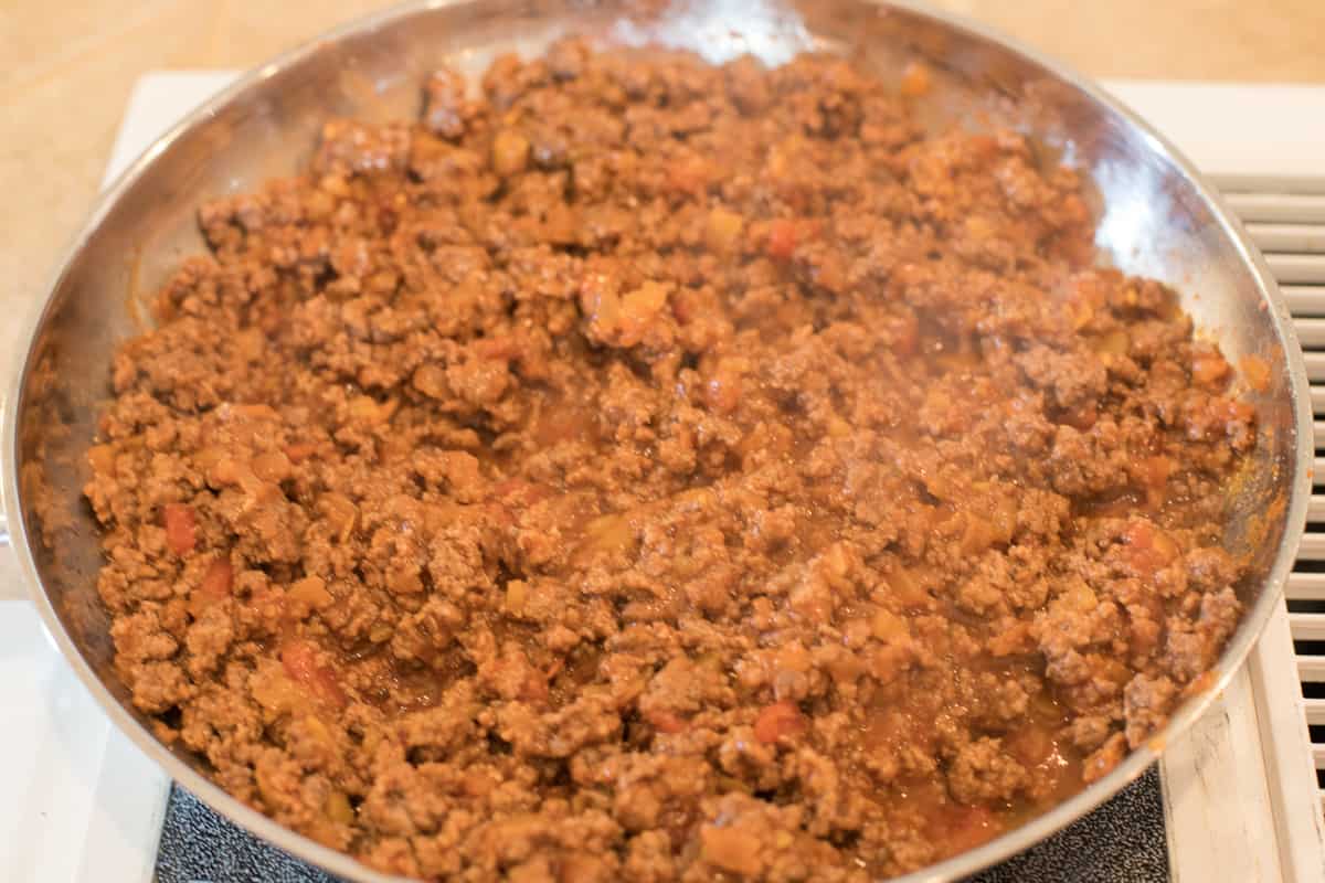 Salsa taco mixture in the frying pan is ready to eat.