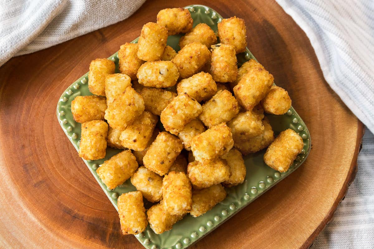 A plate of crispy tater tots.