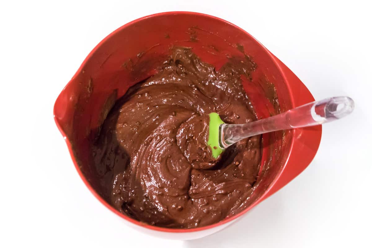 Mix the flour, cocoa powder, and eggs together with the butter, sugar, and vanilla extract.